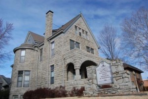 Gans House Exterior with Firm Sign